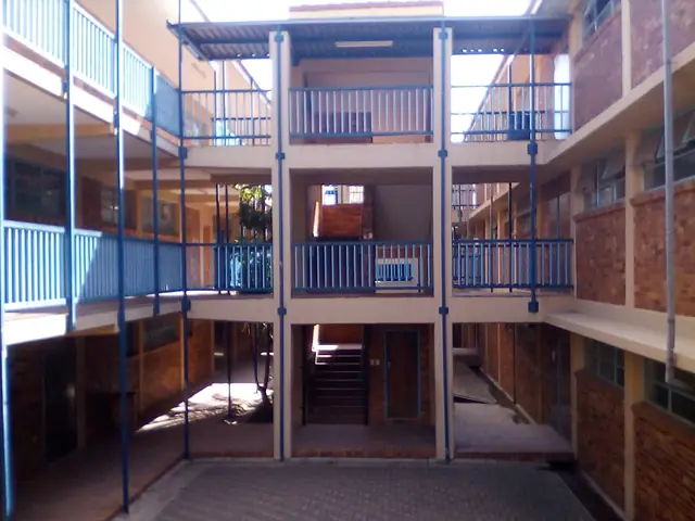 Inner courtyard and upstairs walkways between Allen Glen High School classrooms