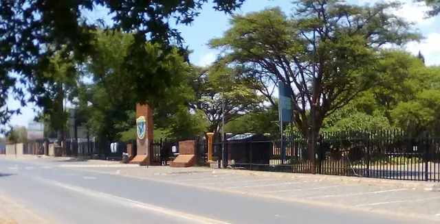 Allen Glen High School fence and entrance seen from the street in Roodepoort