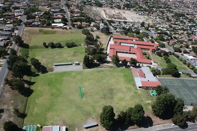 Aerial view of Bastion Primary School buildings and sports fields in Protea Heights