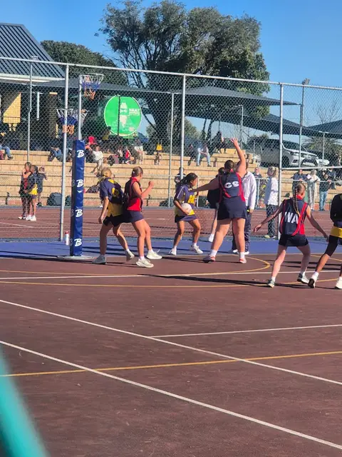 Learners playing netball on the Bastion Primary School courts