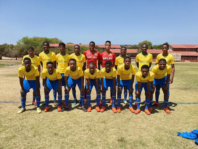 Clapham High School soccer team posing on the sports field