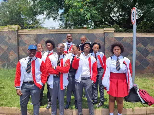 Group of Florida Park High School learners in uniform outside the school