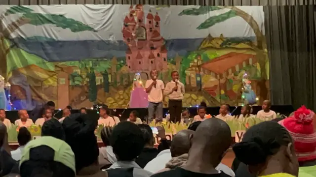 Meredale Primary School learners performing a school play on stage
