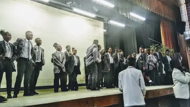 Norkem Park High School learners performing on the hall stage