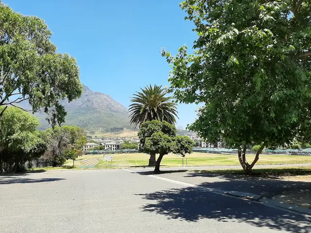 Rhodes High School grounds with a view of the mountain