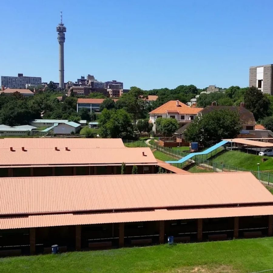 Aerial view of Central Johannesburg College rooftops with the Johannesburg Hillbrow Tower in the background