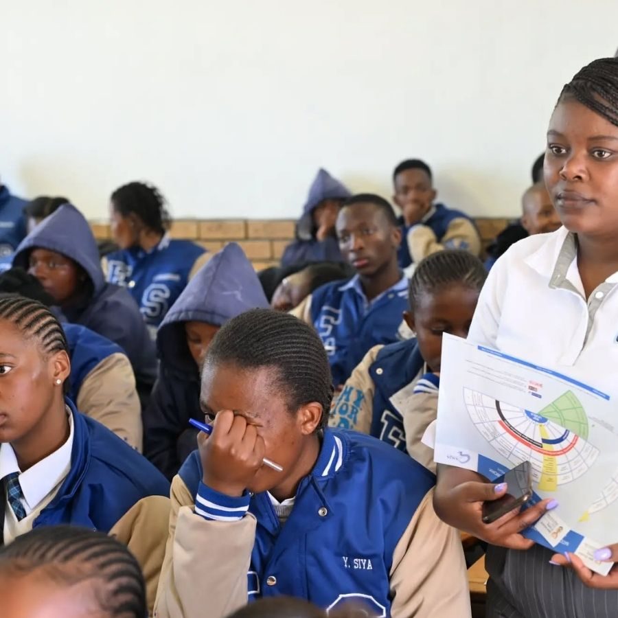 King Sabata Dalindyebo TVET College Classroom Session King Sabata Dalindyebo TVET College students in uniform jackets seated in a classroom as a staff member presents.