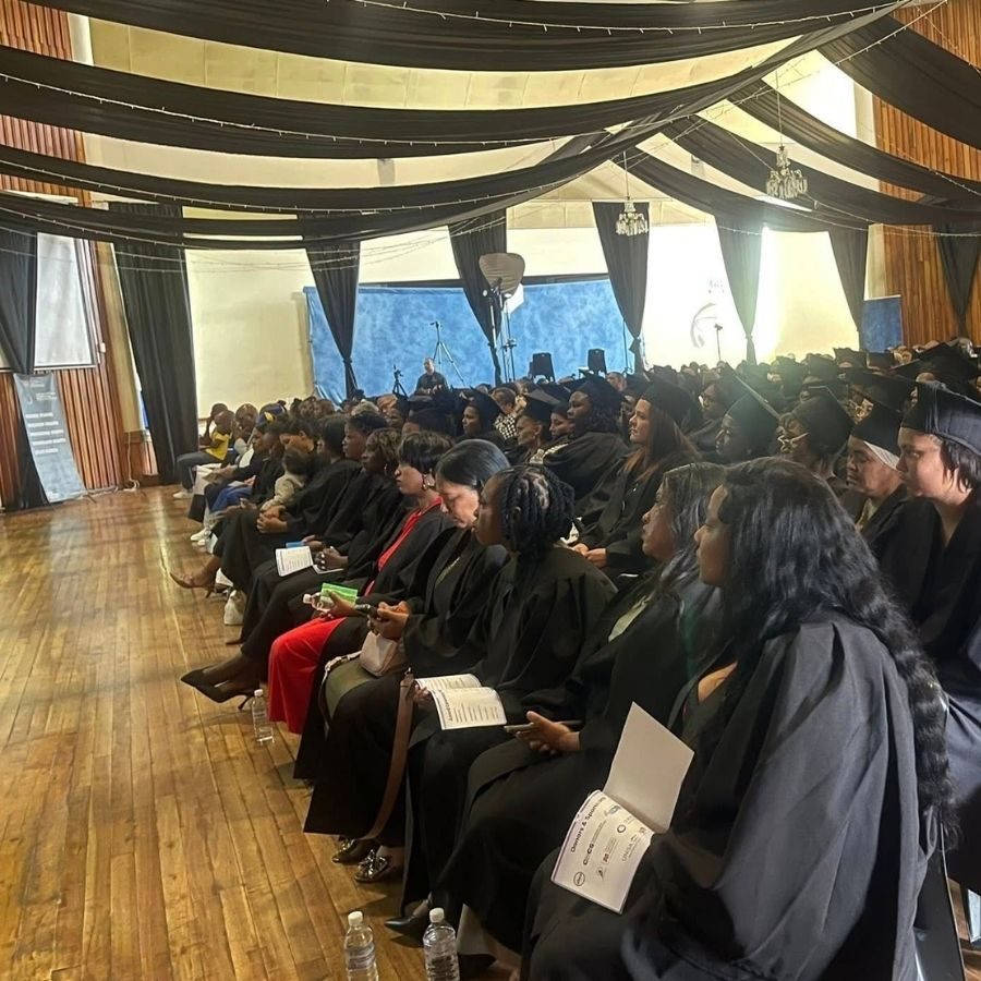 South Cape TVET College Graduation Ceremony Audience Graduates in academic gowns sit in rows during a South Cape TVET College graduation ceremony.