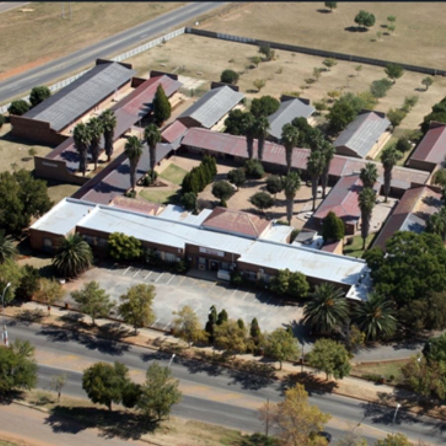 Vuselela TVET College Campus Aerial View Aerial view of the Vuselela TVET College campus buildings, parking area, and palm-lined walkways